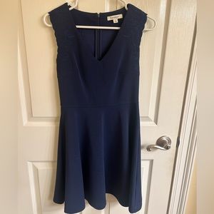 Navy Francesca’s cocktail dress with navy embroidery